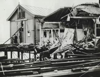 Shaking the district, a German mine smashed this east coast pier and brooke windows in buildings throughout the area