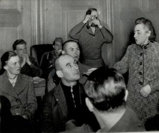 Accusing finger of prosecution witness, Minna Zachow, points at Imgard Huber, left, and Philipp Blum, second from left, who were sentenced to long pri(...)