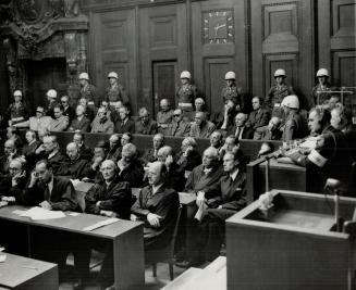 Listening intently, the Nazi war criminals hear Nuremberg verdict