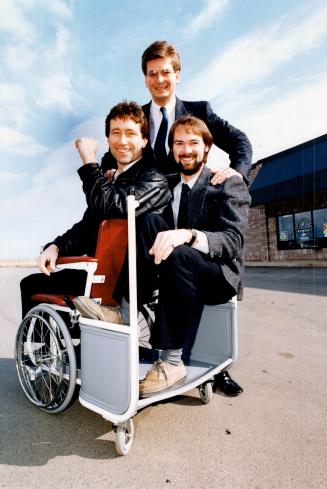 Re-Inventing the Wheelchair: Jerry Gain, left, Chris Dawson and Brian McLuckie test their chair