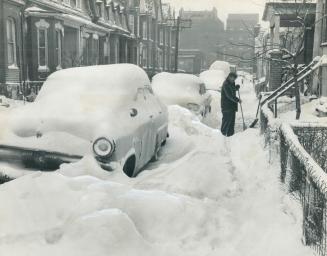Snow-clogged streets confronted Metro Toronto residents when they looked out their windows this morning