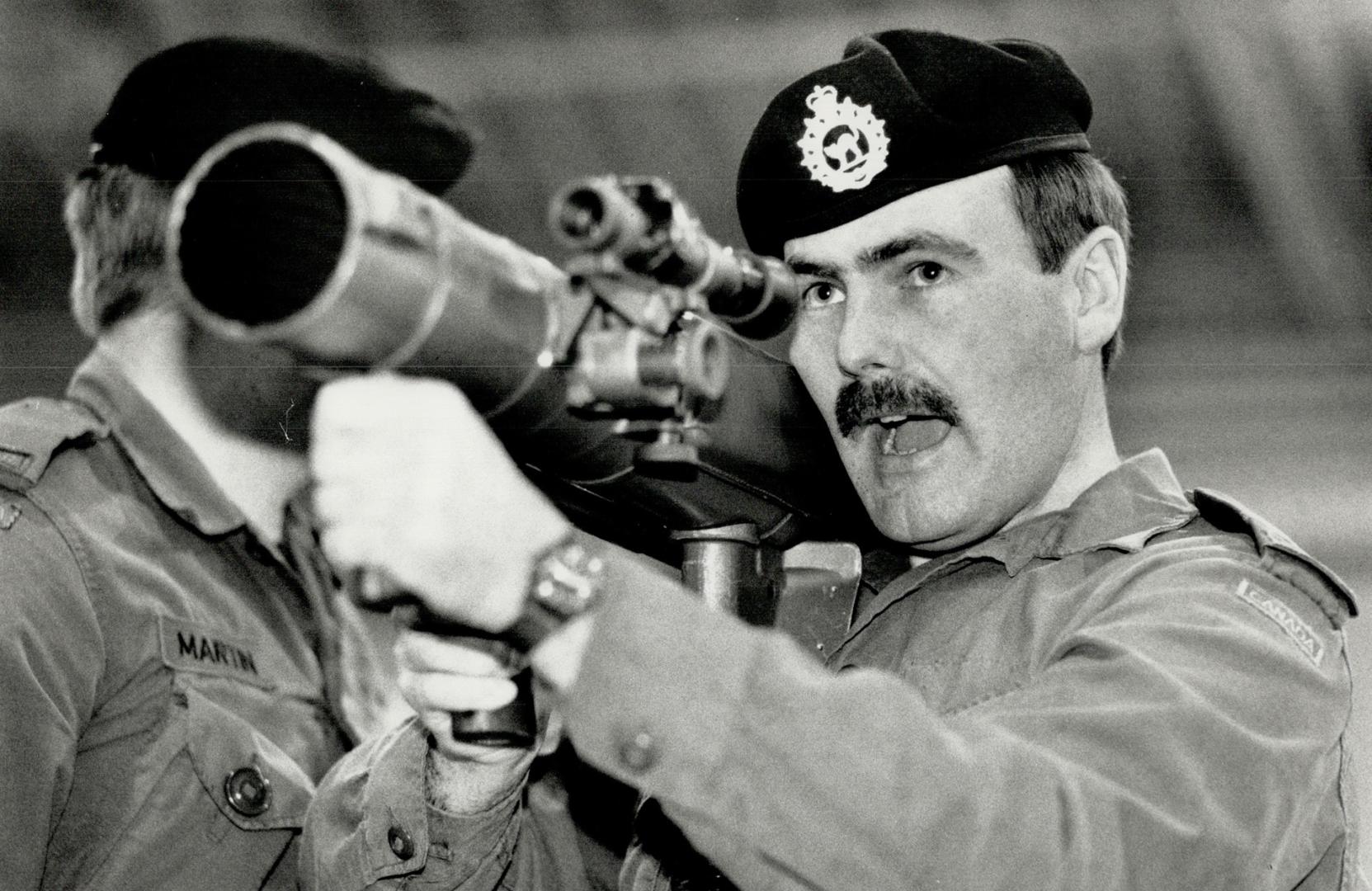 Aiming: Second Lt. Dave Morrissey learns how to use an anti-tank weapon at the Oshawa armory. Ottawa has approved funds for a new armory to replace th(...)