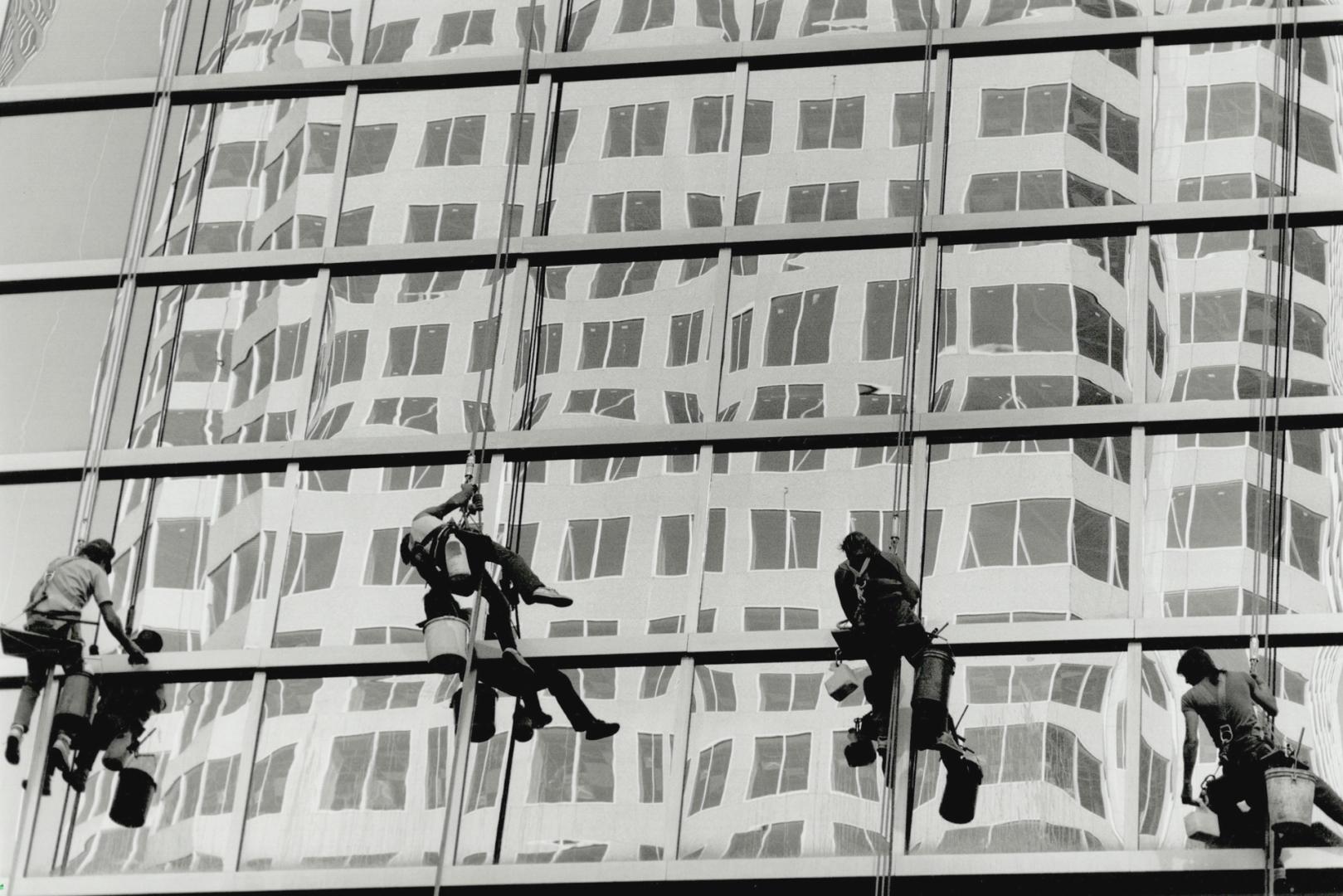 Window on the world, Window washers get a skewed view of the building across the street from the A