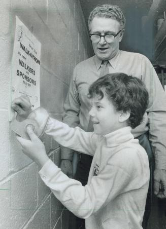 The youngest person ever to be awarded a Civilian Citation by Metro police commissioners is 9-year-old Kenneth Turner, signing up for the Downtown Boy(...)
