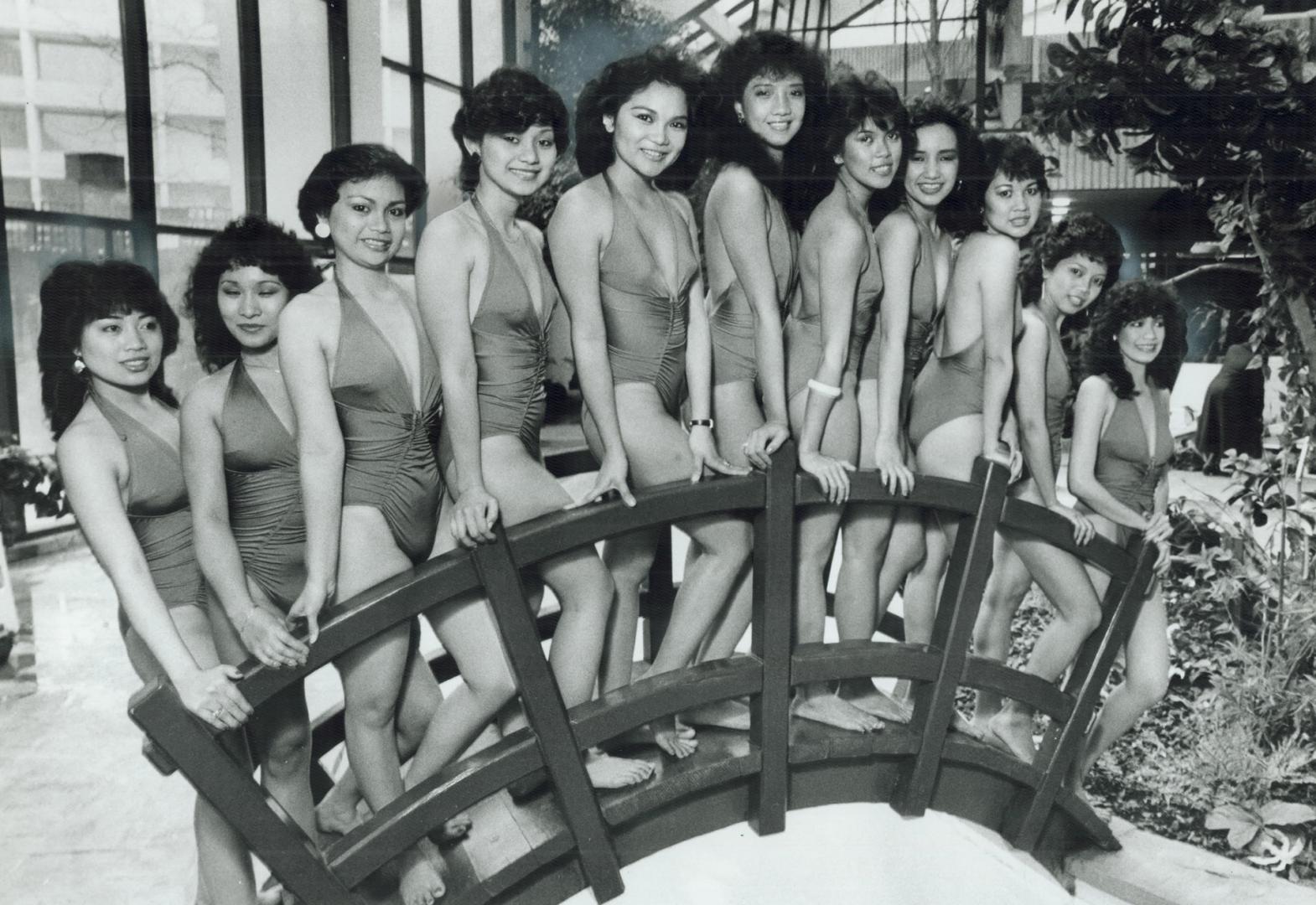 Contestants for the Miss Philippines Canada and the Pearl of the Philippines beauty contests in a dress rehearsal for the contests Saturday night. Fro(...)