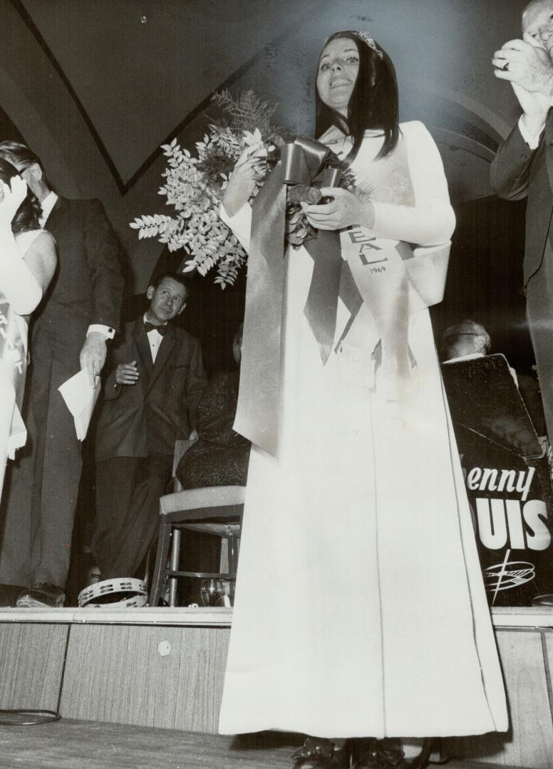 Miss United Appeal, Kathy Fischer, 17, of Parkdale Collegiate, smiles after she was chosen Miss United Appeal at Simpson's Acadian Court Saturday, Miss Fischer won a $500 scholarship