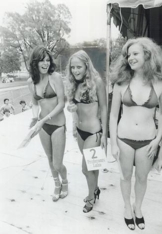 Blonde in a bikini, She's a 19-year-old honey blonde, a model with girl-next-door good looks and she's the Miss Chin Bikini winner. But, ahh, the competition was pretty tough at the picnic yesterday