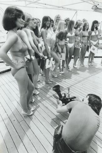 Decked out, Some of the 21 Miss Chin Bikini Pageant contestants turn on the charm aboard the Jadran at the foot of Yonge St. yesterday in a preview of(...)