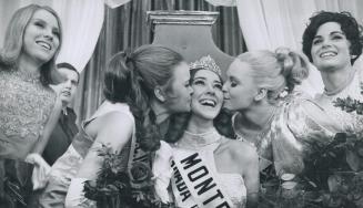 The new Miss Canada, 17-year-old Montreal student Marie-France Beaulieu, gets kisses from two of the finalists in contest, Karen Hegland (left) who wa(...)