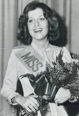 Miss Argo 1974, Madeline Smith, 21, smiles with delight after being chosen Miss Argonaut at Skyline Hotel yesterday
