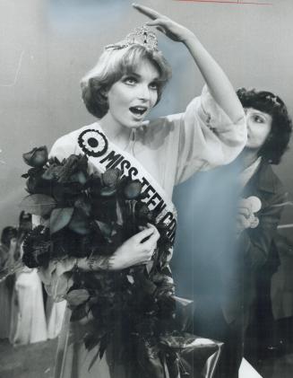 A Tipsy Tiara is grabbed by 17-year-old Julie Simoneau of Quebec city just after she was crowned Miss Teen Canada last night. The 5-foot, 8-inch honey(...)
