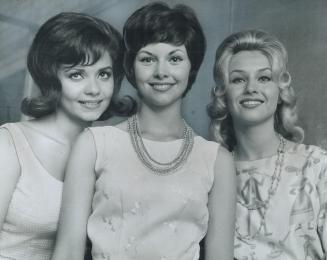 Victors in glamor game, Pretty Carol Goss (centre) won a preliminary of the Miss Toronto Contest last night at the Canadian National Exhibition grandstand