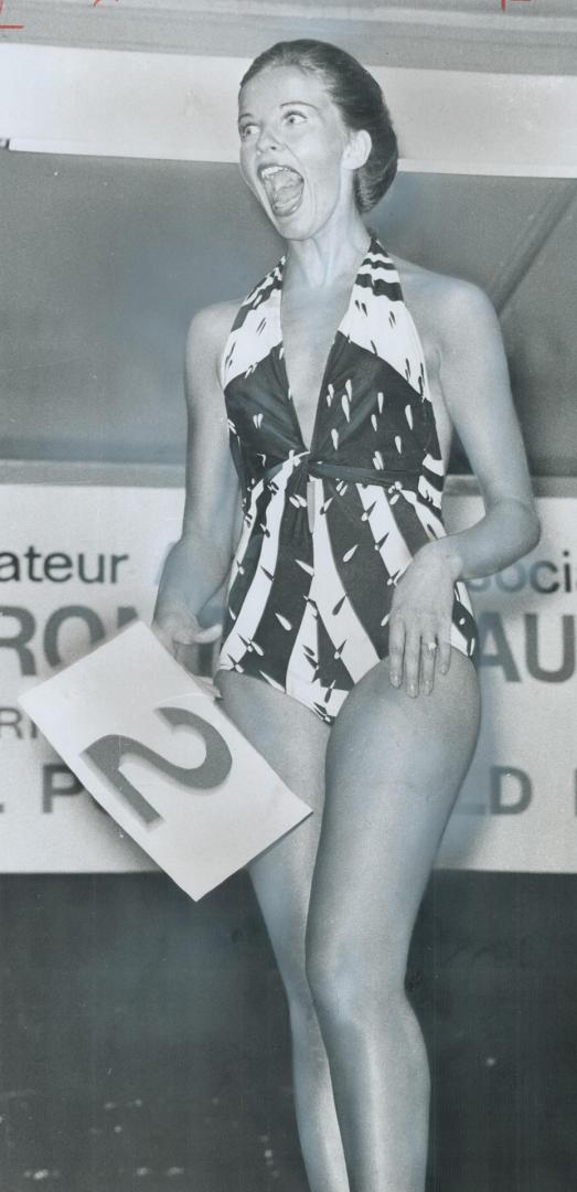 Eyes and mouth wide, 19-year-old Barbara Berezowski learns she was chosen Miss Toronto at the Police Games Saturday