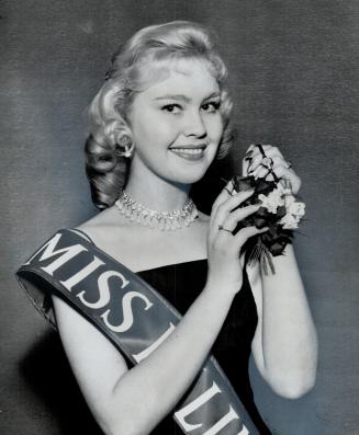 Meet Miss by-line, Pretty Diane Oster, 19, is shown after being chosen Miss By-Line at annual By-Line Ball - the Toronto Men's Press club's annual dance at Royal York