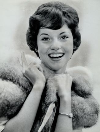 Lots of appeal, Lovely Carole Goss was chosen 1962 Miss United Appeal from among 12 finalists at the U
