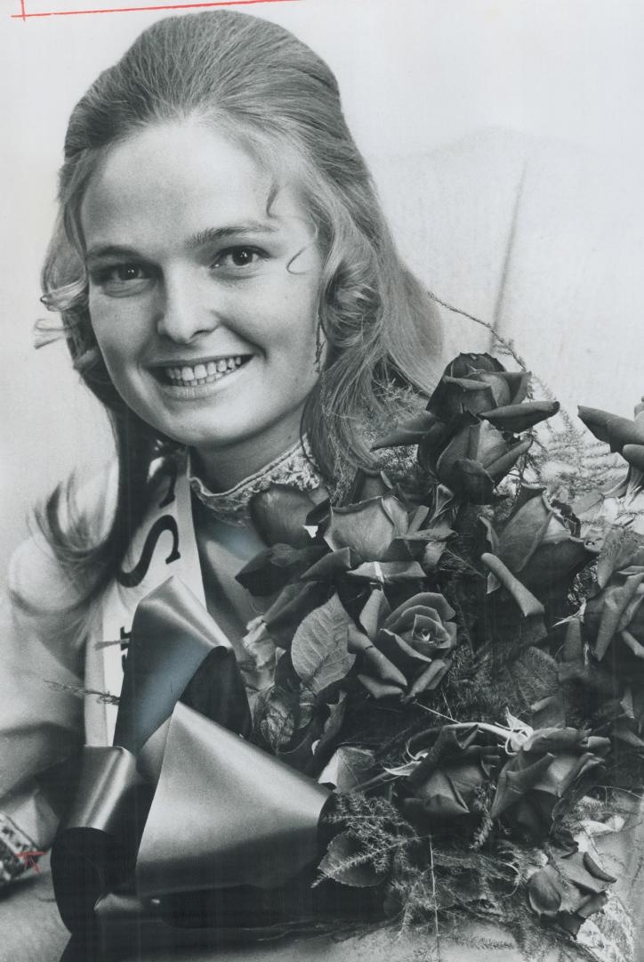 It was roses all the way for Ann MacMillan last night when she was chosen Miss By-Line 1971 at 26th annual By-Line Ball organized by Toronto Men's Press Club