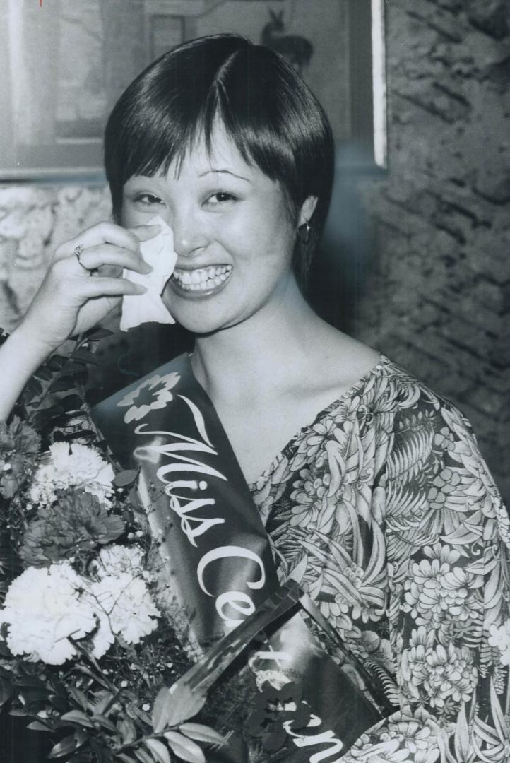 Some beautiful tears, Mona Kadonaga, 22, of Scarborough, wipes away a tear after being chosen Miss Japanese-Canadian Centennial at the Prince Hotel Sa(...)