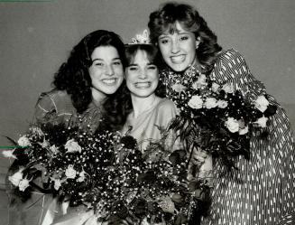 Image shows Miss Teen Toronto: Fifteen-year-old Renee Murphy. Sharing roses with her are Valeri…