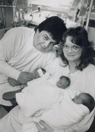 The special k's, Edmund and Darlene Maracle cuddle their babies, who were born on Friday - the first set of quadruplets conceived by in vitro fertiliz(...)