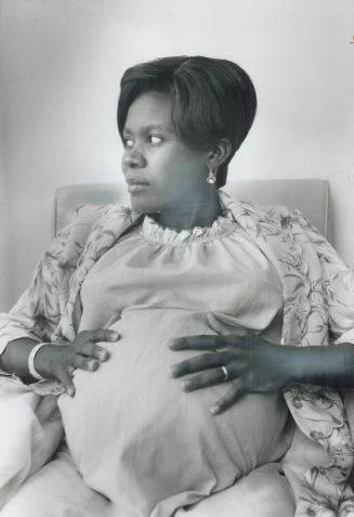 Awaiting birth of quadruplets, 32-year-old Eloise Remy rests in hospital