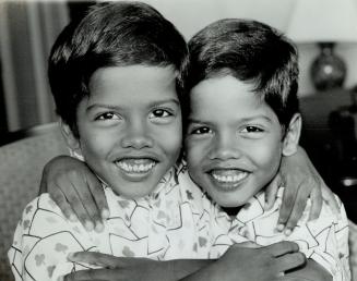 Births - Multiple - Twins - Siamese - Ramkhalawan, Meera and Shiva