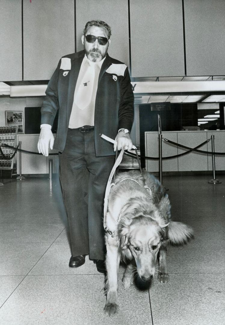 Jerry, a golden retriever, who was born in the White House, steps out in a new life today as a guide dog to a blind Canadian, Homer LeBlond, 46, of No(...)