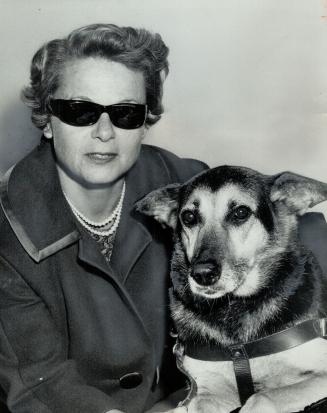 Mrs. Keitlen with her seeing-eye dog