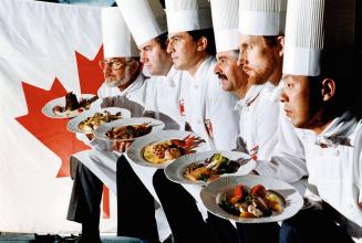 The Canadian team at the World Culinary Olympics consists of, from right to left, Georges Chauvet, Hans-Ulrich Herzig, Pierre Pedeches, Joel Gaillot, Niels Kjeldsen and Tony Murikami