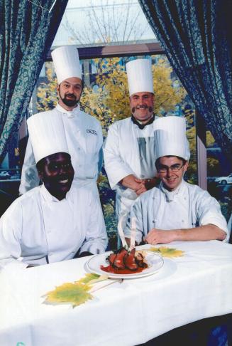 Birthday bash: George Brown School of Hospitality staff and students, clockwise from back left, Roger Maurer, Stephen Langley, Alan Caldwell and Avalon King with venison entree for Escoffier dinner