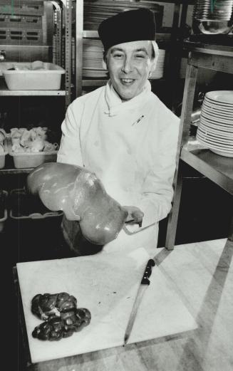 Inside story: Robert Penman shows off liver and kidneys that will be part of his gourmet group's gastronomic fare