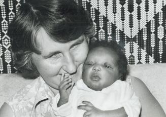 Mystery baby held by temporary guardian Ruth Smith
