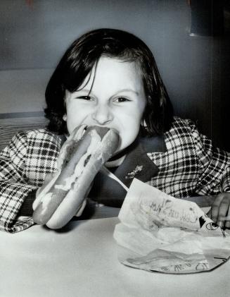 Star probe's Polish Orphan, Barbara Anne Czerwinski, 8, adopted from an orphanage in Poland with the help of Star Probe, eats her first hot dog since (...)
