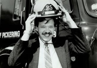 Stress buster: Rev. Stan Ball counsels Pickering firefighters