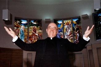 For windows, candy's dandy, Two of the five stained glass windows in Father Bernard Canning's St