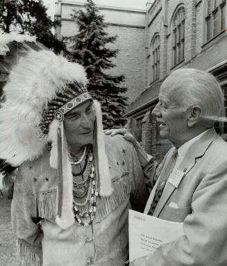 Conventional Pow-Wow, Hardy Johnson (left) of Ohsweken meets Rev