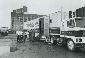 Mobile Chapel, in a truck attracts Direct Winters Transport employees during a visit to Toronto's Terminal Warehouse