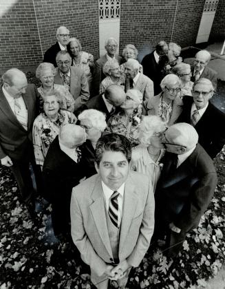 The 50 Club: Rev. Paul Kerr (front) of Forward Baptist Church on Gerrard St. E. invited the couples in his congregation who'd been married for over 50(...)