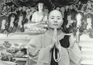 Preaches Buddhism: Kwang-Ok Sunim, above, is the only ordained female Buddhist priest to head a temple in Toronto