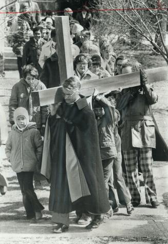 Easter Remembrance, Rev. Wilbur Lang of St. Mark's United Church leads procession of 100 people from St. Mark's and St. John the Divine Anglican Churc(...)
