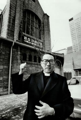 Moving soon: Rev. David Lew gestures toward his church on Chestnut St. near City Hall which will be torn down to make way for a hotel, condominium and(...)