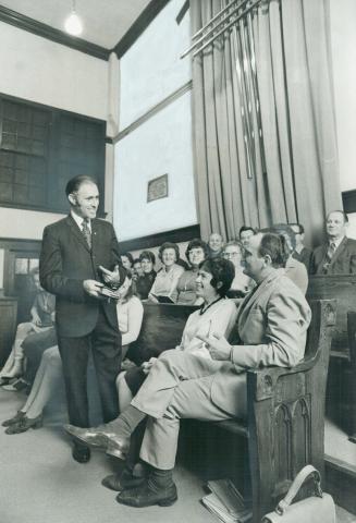 Rev. Joseph Novak, pastor at the Czechoslovak Baptist Church, chats with Mr. and Mrs. John Alac of Mississauga. The Alacs escaped from Czechoslovakia (...)