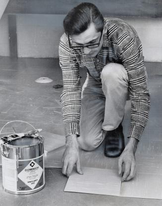 Rev. Donald Whiteside, home on furlough from Columbia, lays tile for a friend. After serving a prison sentence for armed assault with intent to rob, W(...)
