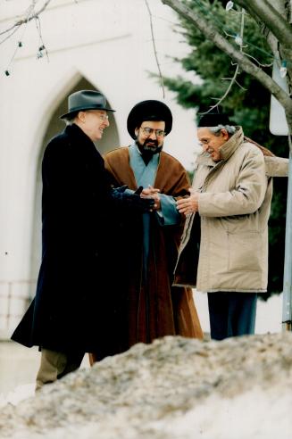 Multifaith effort: From left, Rabbi Michael Stroh, imam Sayed Muhammad Rizvi and Zoroastrian priest Nozer Kotwal discuss project