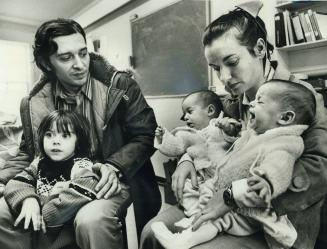 Facing Deportation to his native Argentina, Antonio Manuel Diaz, 30, holds his son, Christian, 2, while his wife, Norma, holds twins Sheyle and Myrne,(...)