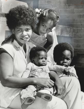 Julia Farquharson relaxes with her three children