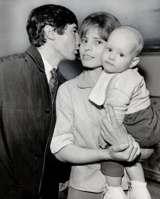 Mrs. Seka Cecich and year-old son Dennis bid Slovako Smoljan goodby as he leave for airport