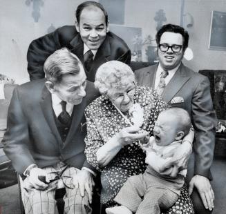 Scene-stealer Glenn Bunn, aged 7 months, grabs great-great-grandmother Bessie Bunn's attention at a five-generation reunion in her apartment. Also in (...)