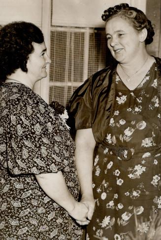 It's a lovely party. Mrs. A. Hollis Timleck (Right) told Mrs. Nagle it was a wonderful party. A fiddler played square dance music and everybody took p(...)