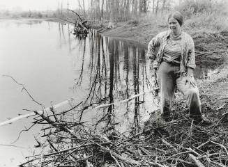 Jane Topping: Athens, Ont., woman surveys damage to a beaver dam on her 100-acre farm. The dam was dynamited last month, killing much of the wildlife,(...)
