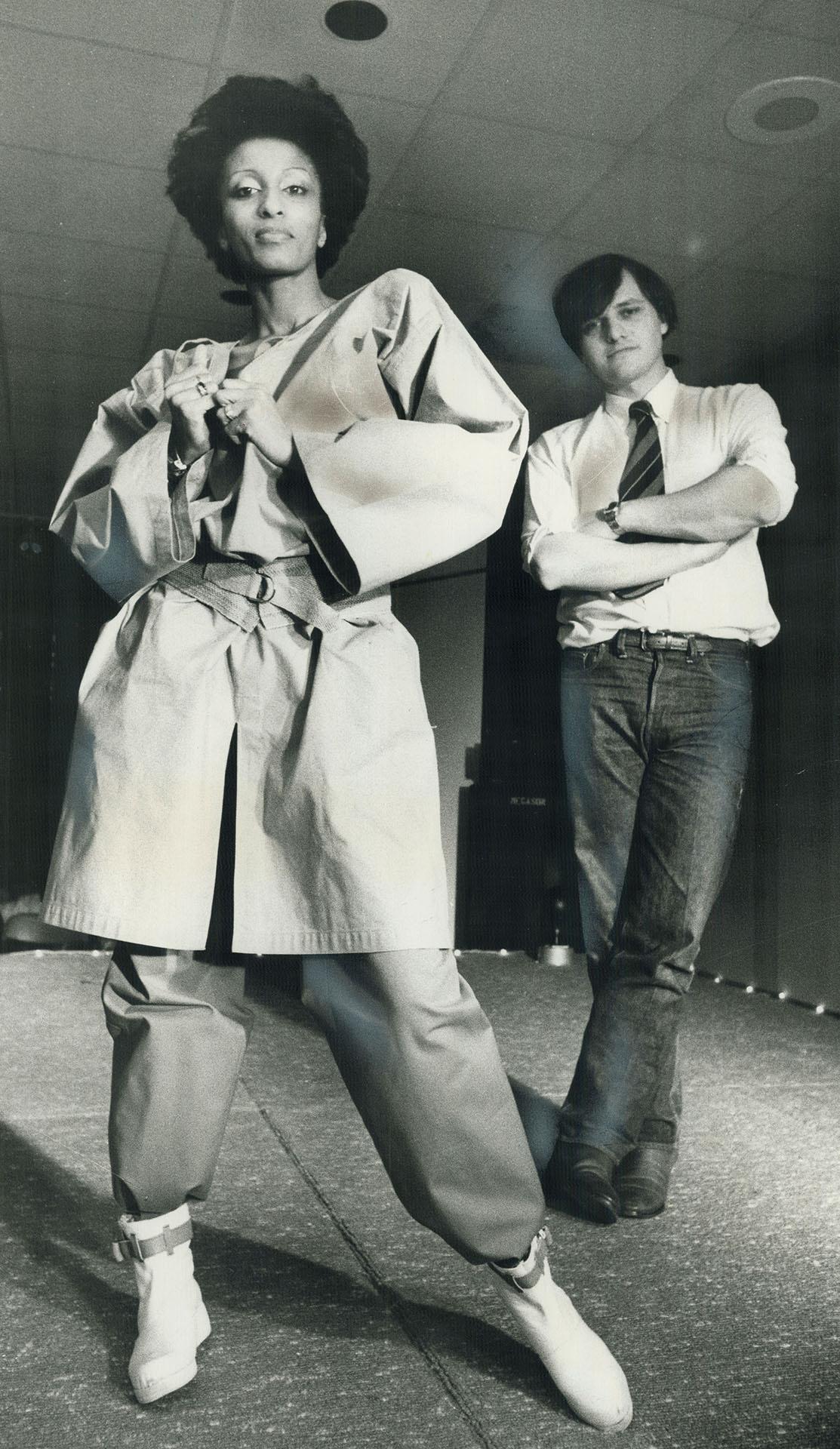 Paris designer Jean-Charles de Castelbajac watches a model wearing